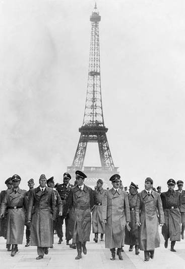Adolf Hitler German Nazi politician in front of the Eiffel Tower in Paris June 1940 Next to him from the left SS leader Karl Wolff the architects...